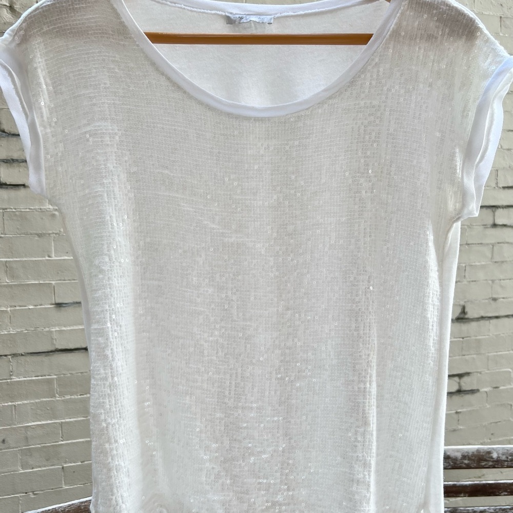 Fun white sequin short sleeved top never worn. Size M/L